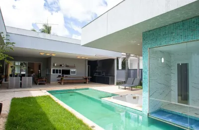 Casa de 457,49 m² com 04 suítes para alugar por r$ 35.000,00 - alphaville res. cruzeiro do sul - goiânia-go.