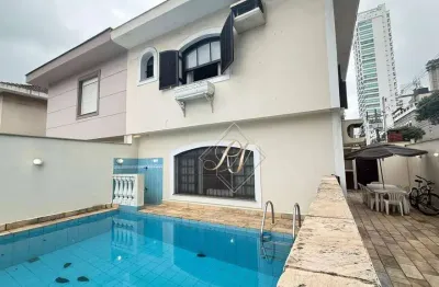 Sobrado amplo de esquina, super charmoso e com total privacidade na ponta da praia. com uma área externa excelente com piscina e churrasqueira!!!!