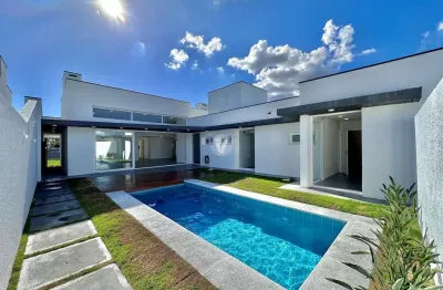Casa alto padrão toda térrea com 3 suítes, escritório e piscina no condomínio vi