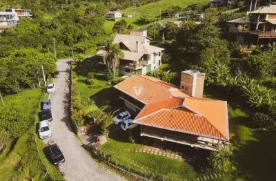 Fantástica casa em garopaba na praia da vigia em frente ao mar com vista panorâm