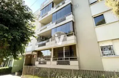 Apartamento de dois dormitórios com vaga de garagem, na região central.