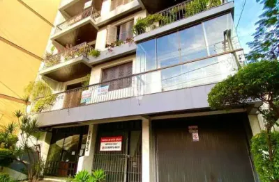 Apartamento de três dormitórios sendo uma suíte e vaga de garagem.