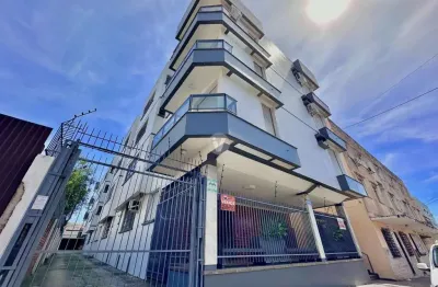 Apartamento térreo 2 dormitórios + dependência no centro de santa maria.