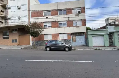 Amplo apartamento central de 3 dormitórios com suíte e box de garagem duplo