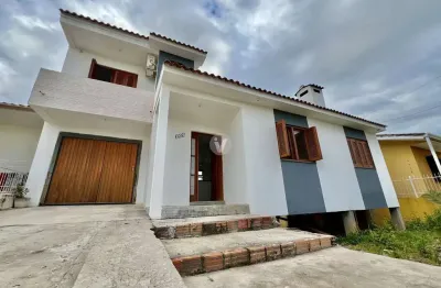 Ampla casa no novo horizonte com 3 dormitórios e 2 vagas de garagem!