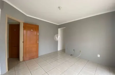 Apartamento 2 dormitórios no centro, próximo a ufn, com elevador e sacada.