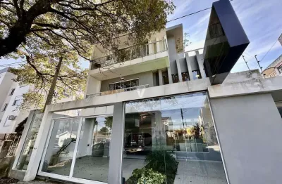 Prédio com duplex de 5 dormitórios + loja comercial