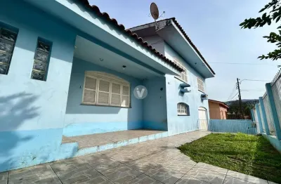 Casa ampla com 3 dormitórios, localizada no bairro rosário