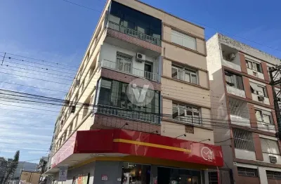 Apartamento amplo com 4 dormitórios, vaga de garagem coberta, localizado na rua