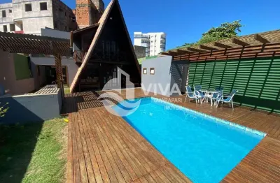 Casa à venda na enseada azul em guarapari-es: 5 quartos, 5 suítes, 2 salas, 7 banheiros, 3 vagas de garagem, 153,60 m².