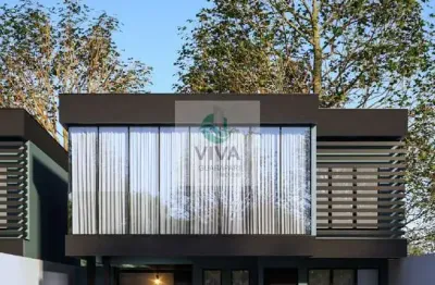 Casa duplex composto por 3 quartos com área de lazer á venda na praia do morro, guarapari-es - realize negócios imobiliários.