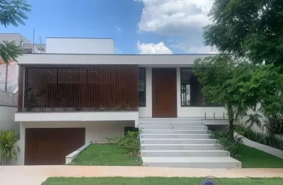 Casa à venda em condomínio alphaville dom pedro 3 em campinas-sp: 3 suítea,  sala, 4 banheiros, 6 vagas de garagem, 350m². nova e térrea!