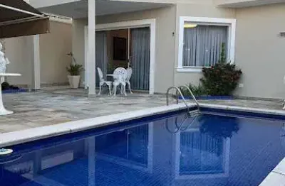 Casa em condomínio fechado com 4 quartos para alugar na Alameda Bertioga, Alphaville, Santana de Parnaíba