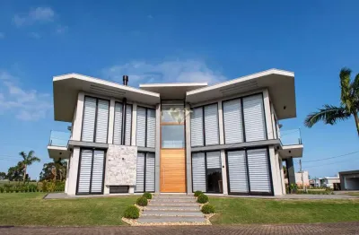 Casa semimobiliada à venda em torres - residência oceanside
