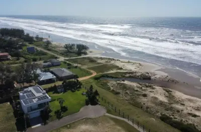 Lote em condomínio fechado para venda em torres / rs no bairro praia itapeva