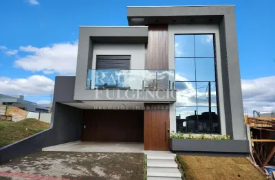 Sobrado com 215 m2 construidos, 3 suites, piscina e excelente padrao de acabamentos no cond. moradas do vale - zona sul de londrina