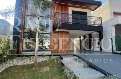 Sobrado novo com piscina, condominio taua aracari 208 m2 de construcao, 4 suites sendo suite master com closet.