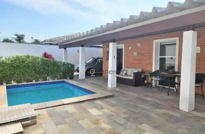 Casa para venda na praia da enseada, região da brunella, 03 dormitórios, 02 vagas, com lazer, 02 quadras da praia