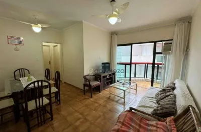 Apartamento a venda na praia da enseada, 02 dormitórios, com sacada e 01 vaga de garagem