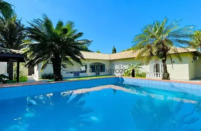 Casa a venda no condomínio acapulco, 05 suítes, com lazer e 12 vagas de garagem