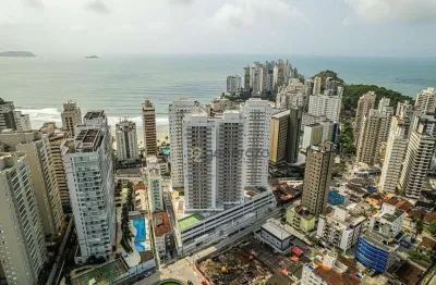 Apartamento a venda na praia das astúrias, prédio novo, 02 dormitórios, 02 vagas de garagem