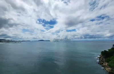 Apartamento a venda na praia das astúrias, frente ao mar, 04 dormitórios, 04 vagas de garagem e lazer