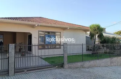 Casa à venda no bairro guanabara em joinville,  com 3 quartos sendo uma suíte por r$750.000,00