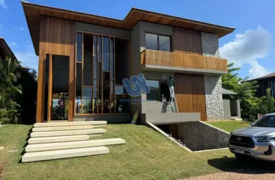 Casa duplex em condomínio 5 suítes 630,00m2 em piscinas naturais ii - praia do forte
