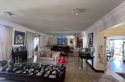 Apartamento quatro suítes, gabinete, sala de tv, duas varandas com 397,00 m2