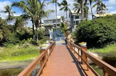 Casa em condomínio fechado 4/4, sendo uma suíte em barra do jacuípe