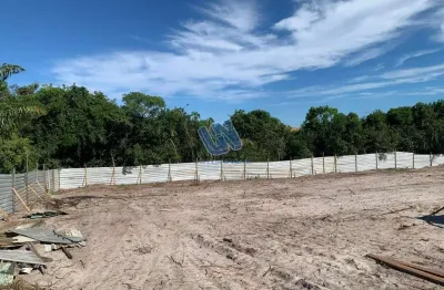 Terreno no condomínio praia bella com área 700m2  plano em praia do forte.