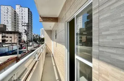 Casa sobreposta alta com sacada lado praia na guilhermina aceita financiamento