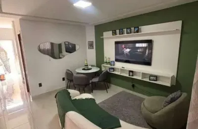 Sobrado com 2 dormitórios à venda, 66 m² por R$ 440.000,00 - Caiçara - Praia Grande/SP