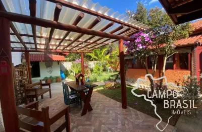 Chácara urbana com estilo rústico, duas suítes e paisagismo! 450m² de terreno!