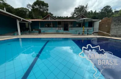 Sonho rural! Linda chácara de 2.900 m² com área de lazer completa e 3 suítes na casa sede!