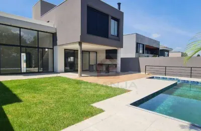 Residência contemporânea com projeto moderno, acabamentos de alto padrão e excelente integração entre os ambientes.