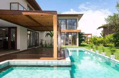 Casa a venda em praia do forte, litoral norte da bahia - condomínio praia bella, acesso direto à praia, 5 suítes de alto padrão com móveis inclusos.
