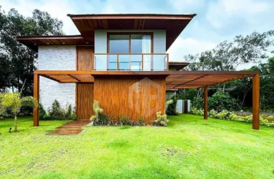 Casa a venda em praia do forte, litoral norte da bahia - condomínio praia bella, acesso direto à praia, 7 suítes de alto padrão perto de tudo.