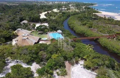 Terreno exclusivo de alto padrão no condomínio enseada do castelo – praia do forte | 800m² | beira-mar | segurança e privacidade