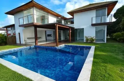 Casa com espaço gourmet e piscina no condomínio ilha dos pássaros em praia do forte – r$2.900.000