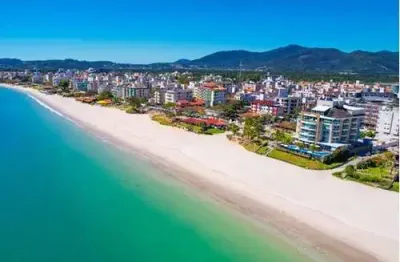 Apartamento tipo para venda em canasvieiras com 2 quartos, sendo 2 suítes, 69m²