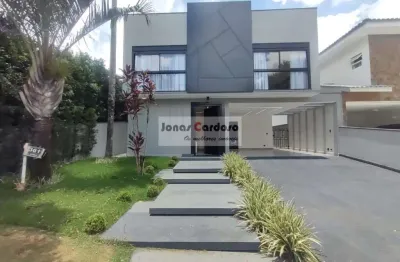 Sobrado no condomínio arujá 5, com 300m² de construção, todo mobiliado, com piscina e 4 suítes, sendo 1 com hidro e closet por r$: 3.500.000. arujá