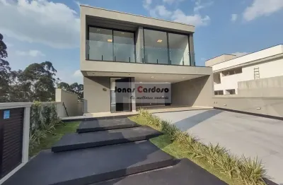 Sobrado alto padrão à venda no condomínio real park em arujá. com 4 suítes, 3 salas, 4 vagas, piscina, tocheiro, área gourmet equipada. confira!