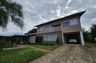 Casa com 4 dormitórios à venda, 380 m² por R$ 950.000,00 - Neópolis - Gravataí/RS