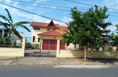 Casa com 3 dormitórios à venda, 253 m² por R$ 1.350.000,00 - Renascença - Gravataí/RS