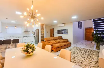 Maravilhoso sobrado em condomínio fechado com 3 suítes à venda no bairro saguaçú em joinville - sc de r$ 2.890.0000,00 por r$ 2.390.000,00.