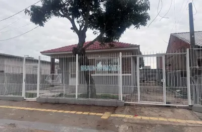 Casa de 3 dormitórios sendo 1 suite em cachoeirinha em excelente localização na parada 56 com 12 metros de frente.