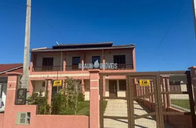 Sobrado 3 dormitórios semi mobiliado  sendo 2 suítes americanas  com sacada no centrinho de nova tramandaí e a 400 mts do mar.