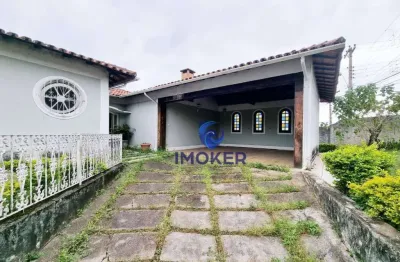 Casa comercial próxima ao centro de poá; diversas salas; área verde