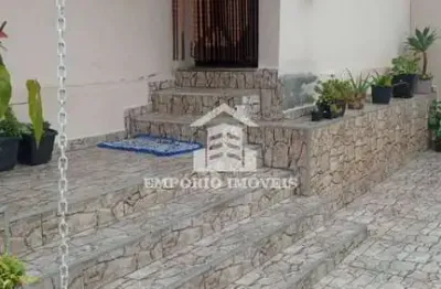 Casa com dois dormitórios e garagem para dois carros em barro branco.